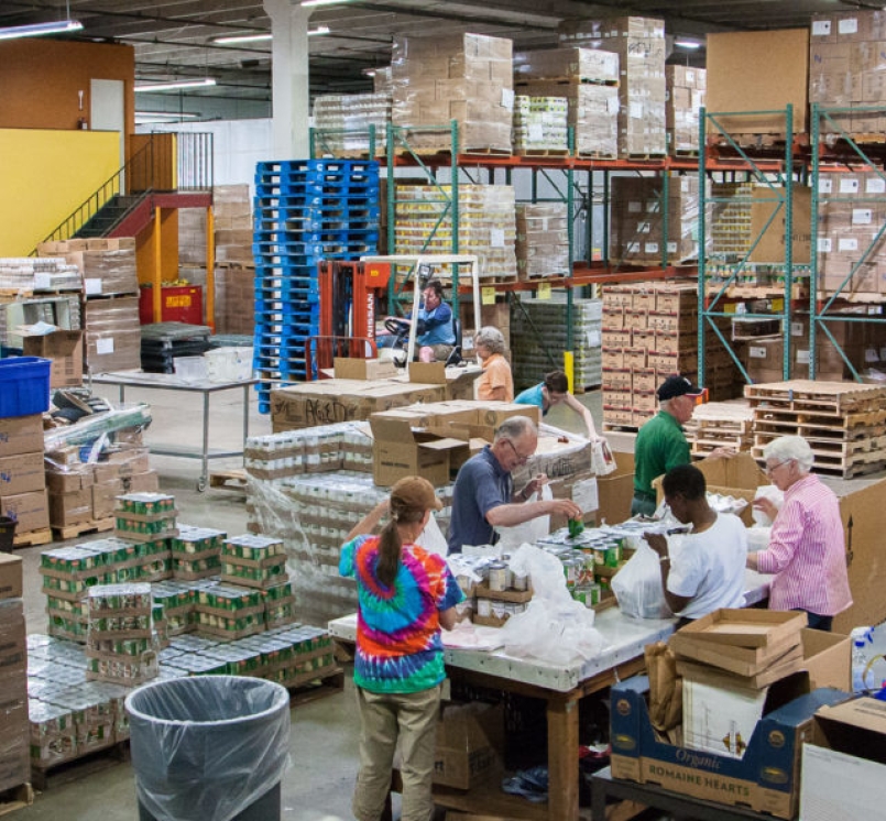 Workers sort meals at the Larimer County, Colo. Food Bank.