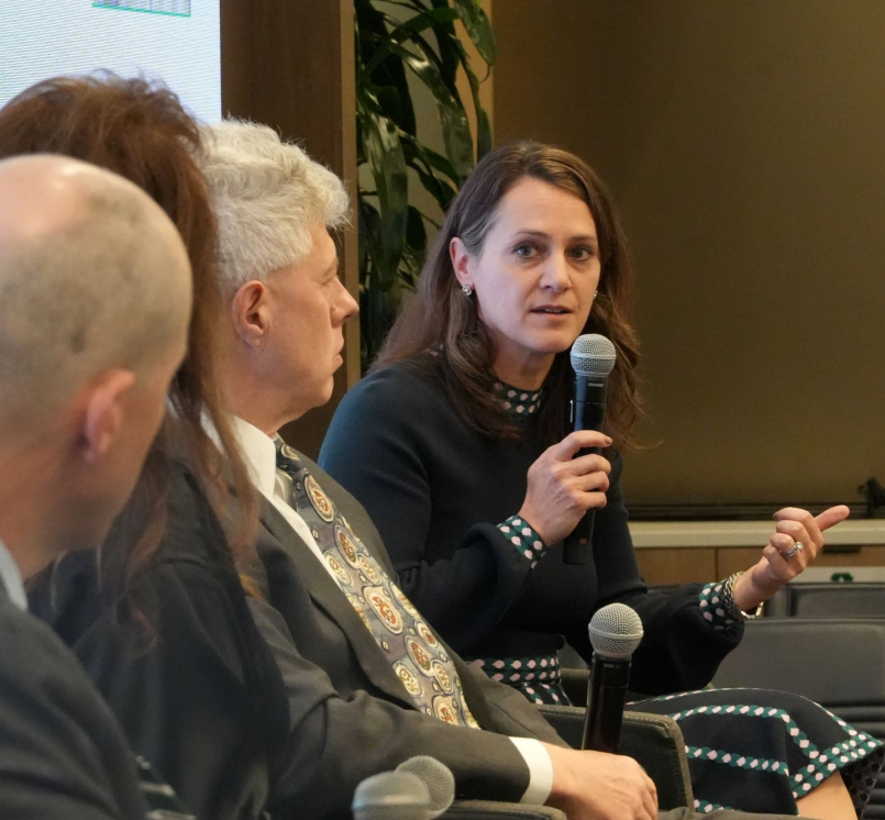 Ann Lichter, director of Resource Rural, tells county officials to offer feedback on federal programs during a RAC Fly-In panel discussion. Photo by Charlie Ban