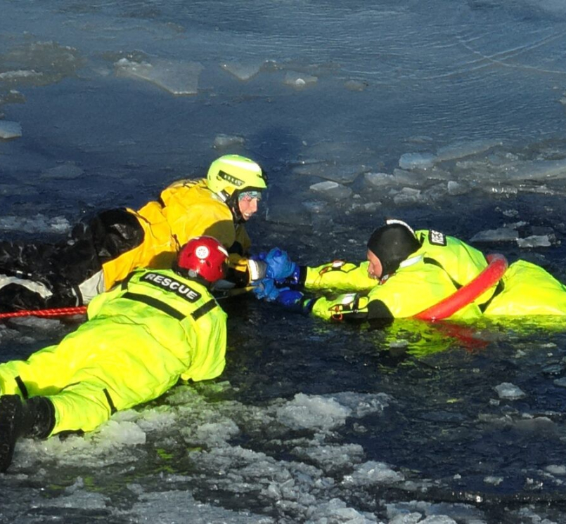 Members of the Delta County, Mich. Ice Rescue Task Force participate in a training exercise.