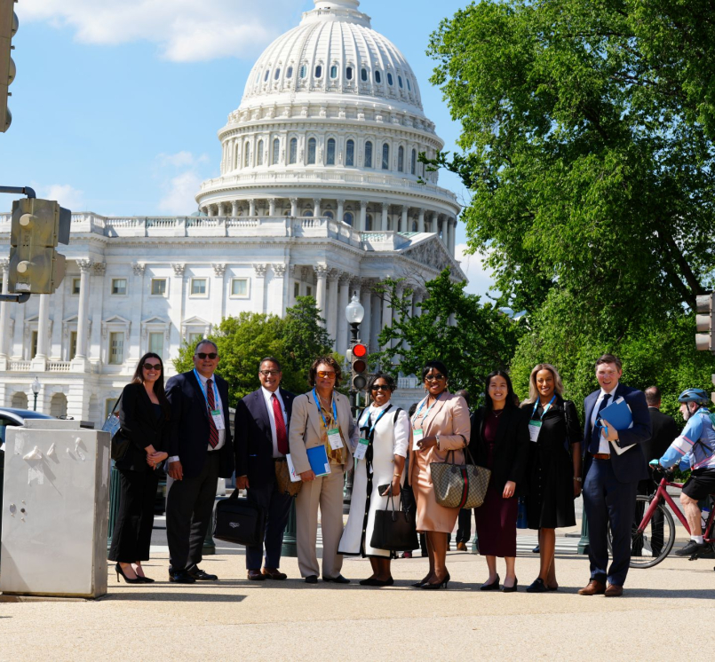 LUCC members pause for a photo near the U.S. Capitol while visiting Washington, D.C. for meetings on housing. Photo by Rich Wills