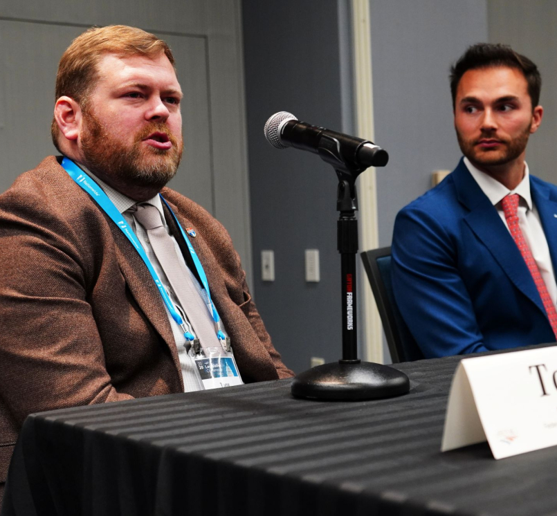 Tony Frye (left) discusses Federal Highway Administration priorities. Photo by Denny Henry