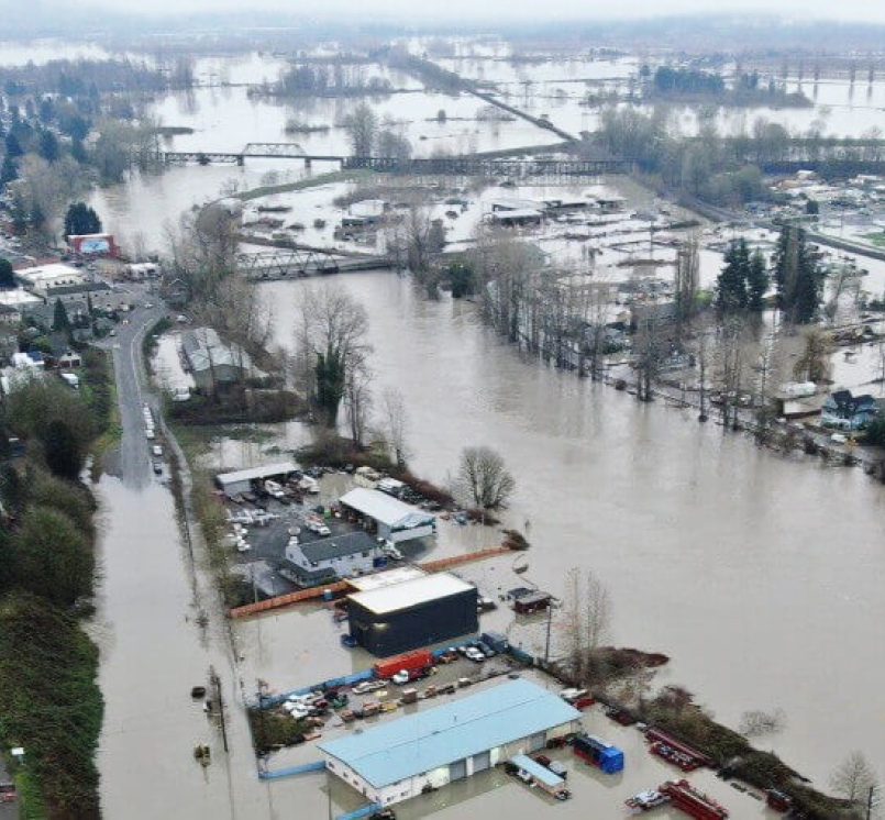 A powerful atmospheric river causes widespread flooding across Washington state in December 2025, damaging homes, businesses and major roadways.