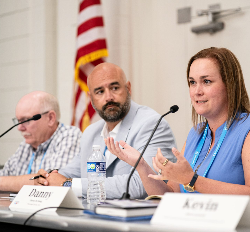 Danny DeHoog, deputy director of Government Relations, Maricopa County, Ariz., discusses state and federal policy impacts with fellow panelists Shawnee County, Kan. Commissioner Aaron Mays (to her immediate right) and Converse County, Wyo. Commissioner Jim Willox. Photo by Denny Henry