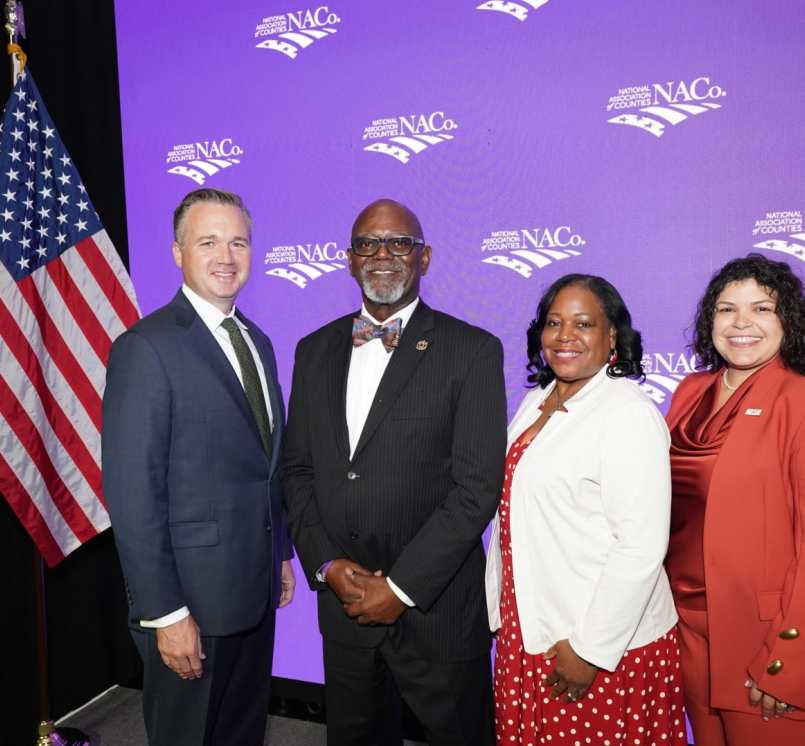 NACo's 2026-2027 officers gather following the 2026 Annual Business Meeting during the Annual Conference in Orleans Parish, La. From left: Immediate Past President J.D. Clark, President George Dunlap, First Vice President Alisha Bell and Second Vice President Sarah Benatar. Photo by Denny Henry