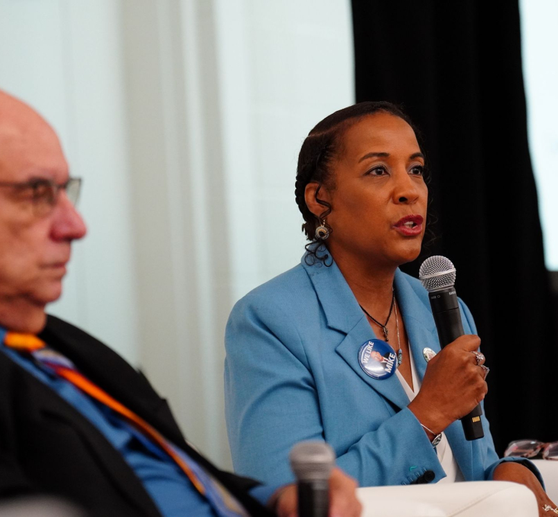 Athens County, Ohio Commissioner Lenny Eliason and Loudoun County, Va. Chair Phyllis J. Randall discuss the Good Governance Is Good Health toolkit Saturday. Photo by Leon Lawrence III