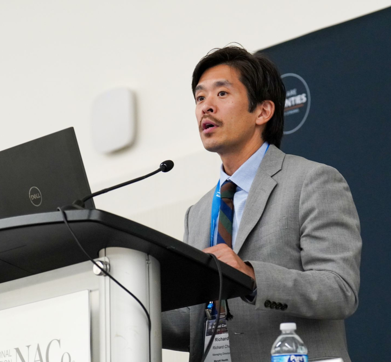 Manatt Health Managing Director Richard Cho outlines opportunities for housing development while addressing the Large Urban County Caucus. Photo by Leon Lawrence III