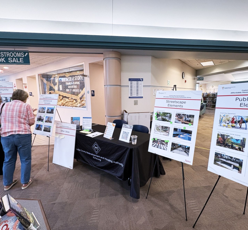Residents peruse information at a recent community engagement event for the Centreville Co-Location Project at the Centreville Regional Library in Fairfax County, Va. Photo courtesy of Fairfax County