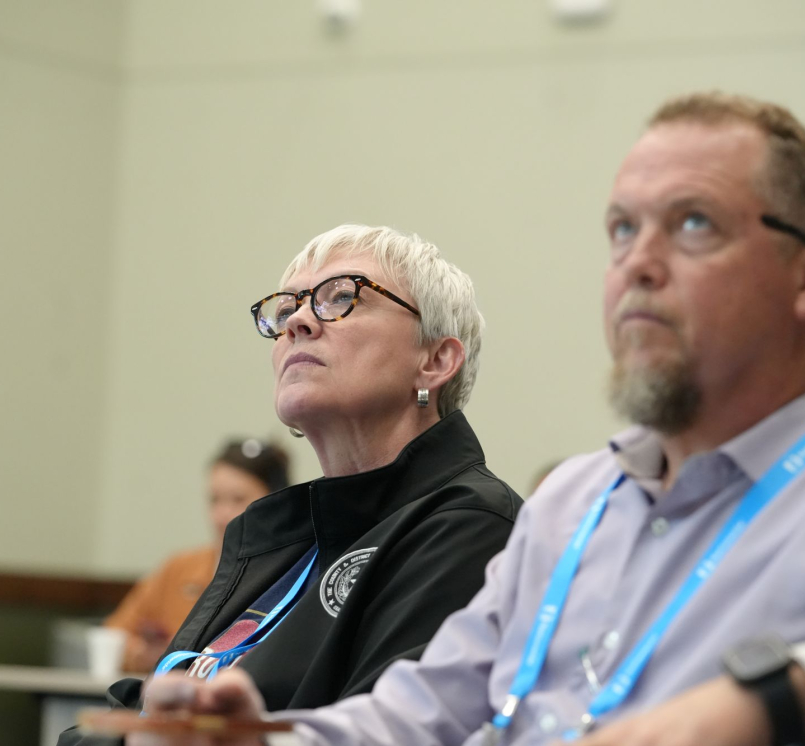 Hemphill County, Texas Judge Lisa Johnson (left) and Cochran County, Texas Judge Pat Henry listen to a discussion about philanthropic organizations managing community benefit agreements. Photo by Charlie Ban