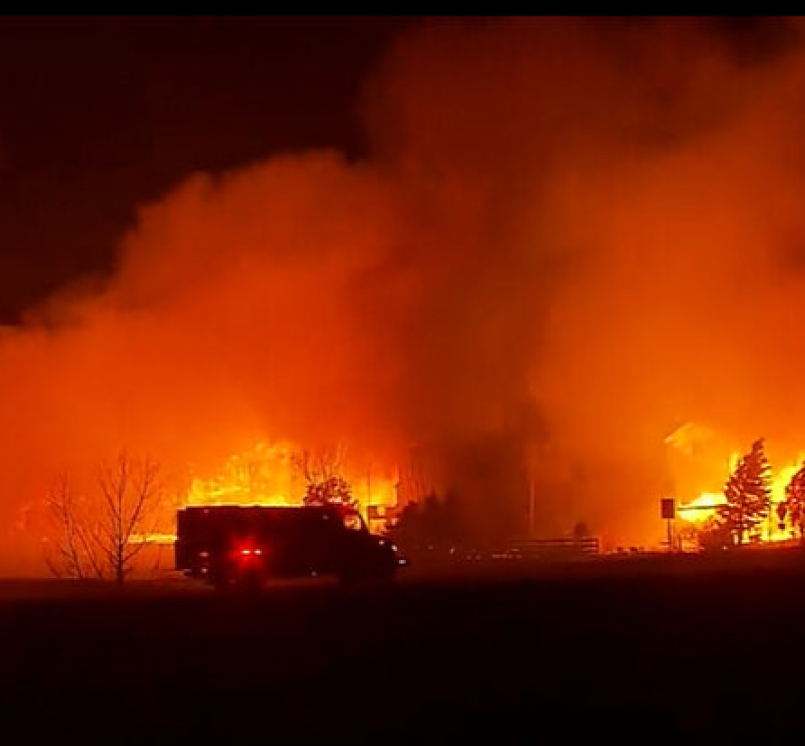 Flames engulf homes in the Marshall Fire, Dec. 30, 2021. Photo by NOAA Boulder