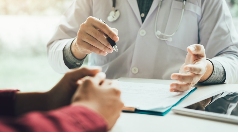 Doctor talking to the patient about menopause and treatment in future