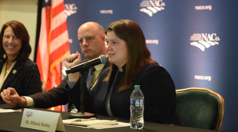 Senate Agriculture Committee staffer Mikayla Bodey describes the coalition of groups — agriculture, nutrition, forestry and rural development — with an interest in the farm bill.  Photo by Charlie Ban