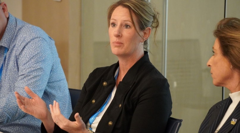 Liberty County, Mont. Commissioner Joette Woods introduces herself to other county officials. Photo by Charlie Ban
