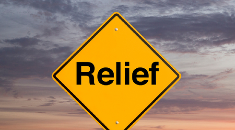 Yellow Hazard sign that says relief