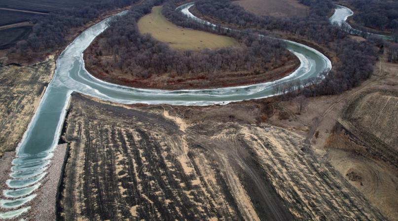 A diversion outlet returns floodwaters to the Red River in northern Cass County, N.D. A diversion channel carries floodwater west of Fargo and other Cass County areas. Photo courtesy of the Army Corps of Engineers