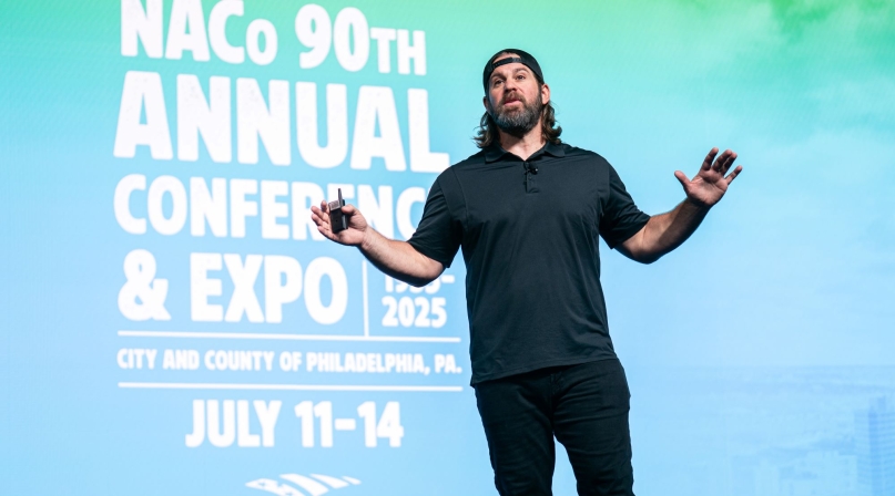 Former NFL player and magician Jon Dorenbos, mesmerizes the General Session crowd Sunday, July 13 with his magic and life story. Photo by Denny Henry