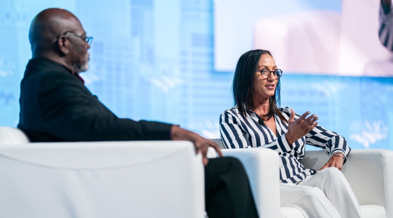 Leslie Boissiere, of the Annie E. Casey Foundation, talks about her organization’s support of youth-centered services with Second Vice President George Dunlap during the Closing General Session July 13. Photo by Denny Henry