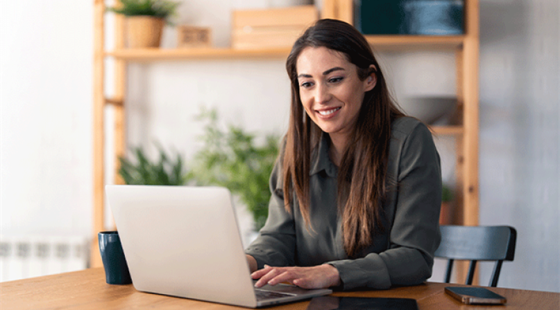 Woman Typing on a computer