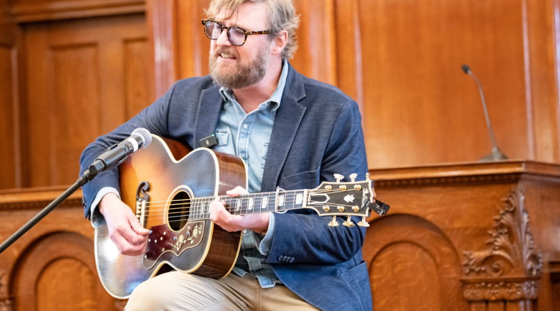 Texas-based songwriter Drew Kennedy sings for the attendees at the County Storytellers Symposium. Photos by Joe and Lisa Duty