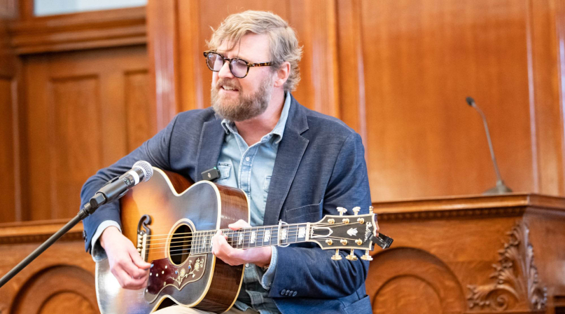 Texas-based songwriter Drew Kennedy sings for the attendees at the County Storytellers Symposium. Photos by Joe and Lisa Duty