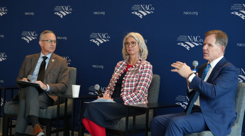 Tangipahoa Parish, La. President Robby Miller outlines the increase in disasters his parish has seen in recent years. Kentucky Association of Counties’ Executive Director Jim Henderson and Monroe County, Fla. Commissioner Michelle Lincoln are to his right. Photo by Charlie Ban