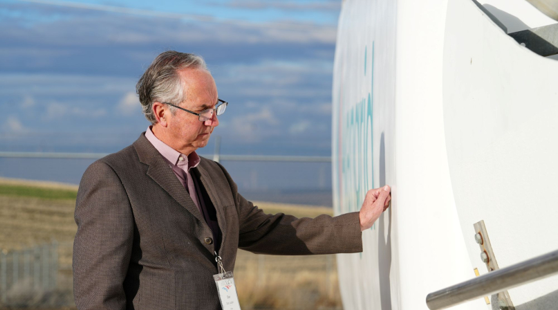 Carson County, Texas Judge Dan Looten gets hands-on with a wind turbine at the Avangrid National Training Center — his first time touching one, despite more than 700 turbines in the county. Photo by Charlie Ban