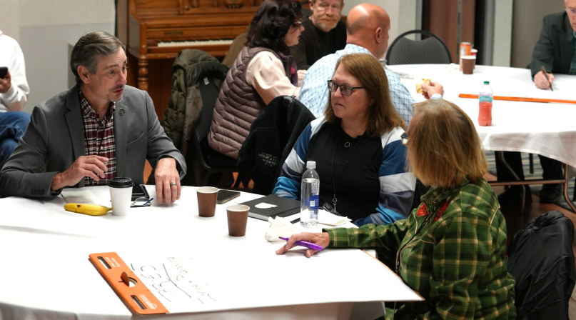Dickenson County, Va. Supervisor Chris Hall, Story County, Iowa Planning and Development Director Leanne Harter and Crook County, Ore. Commissioner Susan Hermreck discuss parameters for regulation of local energy projects during the December 2025 NACo Rural Energy Academy. Photo by Charlie Ban 