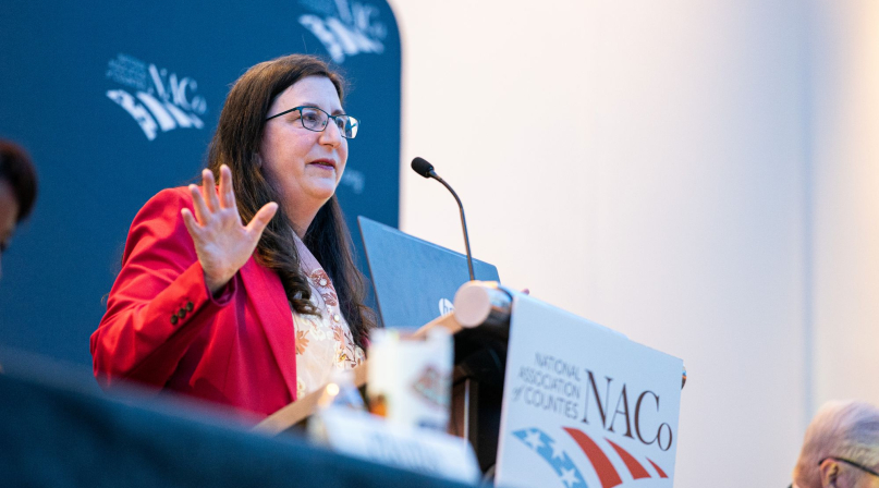 Shannon Smith, director, Public Sector, CAI, speaks Feb. 22 to members of the Mid-Size County Caucus. Photo by Denny Henry