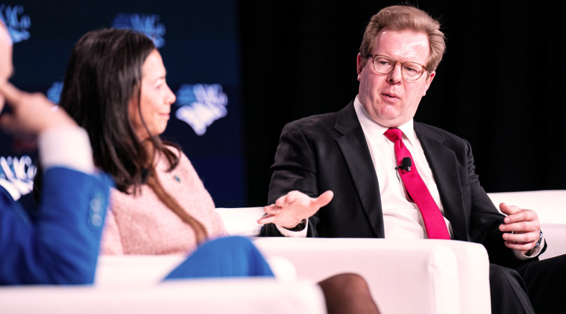 White House advisor Peter Lake explains a multi-state agreement with an electricity market that aims to limit rate increases for the next five years. Photo by Denny Henry