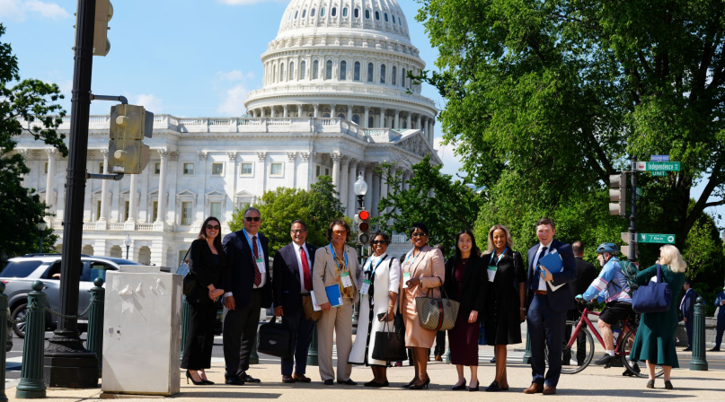 LUCC members pause for a photo near the U.S. Capitol while visiting Washington, D.C. for meetings on housing. Photo by Rich Wills