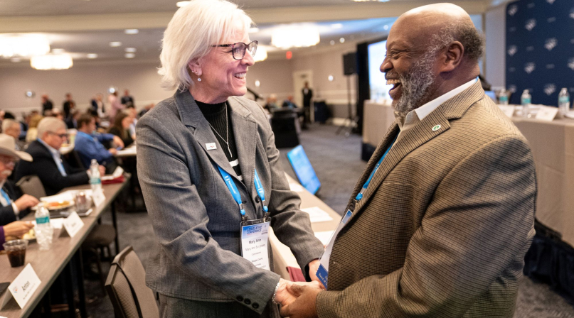 Former NACo President Mary Ann Borgeson greets Beaufort County, N.C. Commissioner Ed Booth during the 2026 Legislative Conference Board of Directors meeting. Photo by Denny Henry
