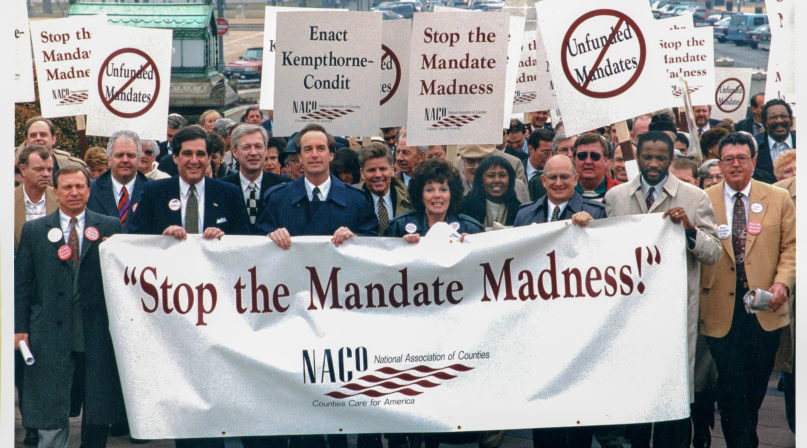 Sen. Dirk Kempthorne (front row, fifth from left) joins a march to the U.S. Capitol during the 1994 NACo Legislation Conference. Photo by David Hathcox