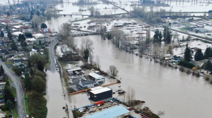 A powerful atmospheric river causes widespread flooding across Washington state in December 2025, damaging homes, businesses and major roadways.