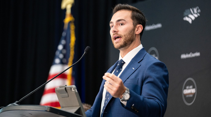 Connor Torossian, associate administrator of the Federal Transit Administration, addresses the NACo Board of Directors Meeting July 19, 2026. Photo by Denny Henry