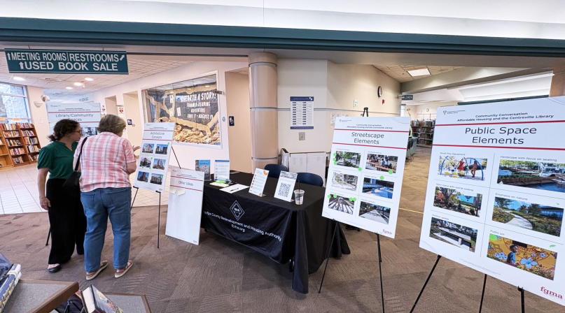 Residents peruse information at a recent community engagement event for the Centreville Co-Location Project at the Centreville Regional Library in Fairfax County, Va. Photo courtesy of Fairfax County