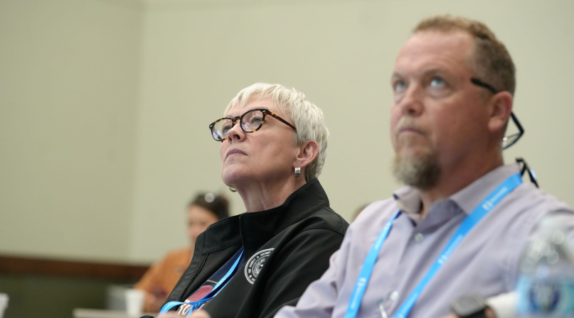 Hemphill County, Texas Judge Lisa Johnson (left) and Cochran County, Texas Judge Pat Henry listen to a discussion about philanthropic organizations managing community benefit agreements. Photo by Charlie Ban