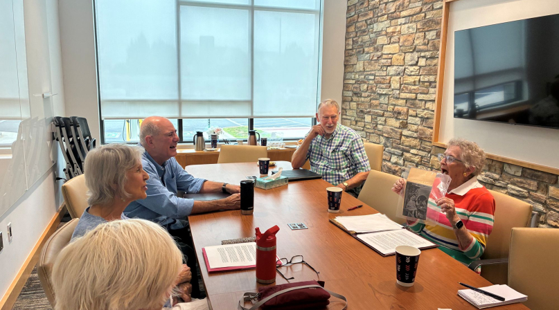 Memoir group participants exchange stories about their childhoods at a Loudoun County, Va. library.  Photo by Meredith Moran