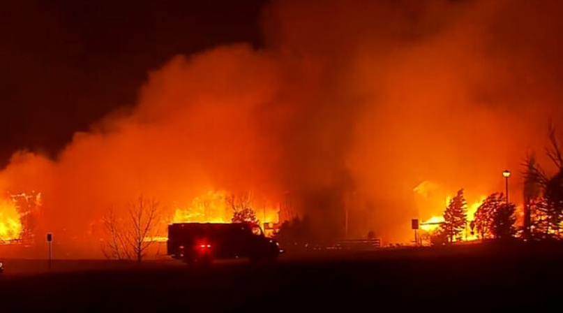 Flames engulf homes in the Marshall Fire, Dec. 30, 2021. Photo by NOAA Boulder