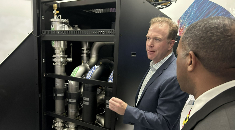 An associate with Digital Realty shows county officials the cooling system in one of its Loudoun County, Va. data centers in October 2024. Photo by Charlie Ban
