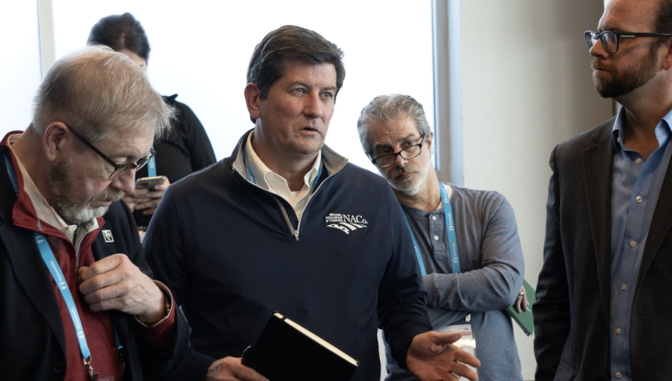 Erie County, N.Y. Mark Poloncarz asks a question at the El Paso County Migrant Support Service Center Photo by Charlie Ban
