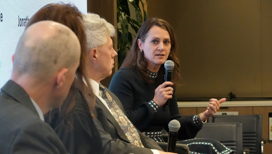 Ann Lichter, director of Resource Rural, tells county officials to offer feedback on federal programs during a RAC Fly-In panel discussion. Photo by Charlie Ban