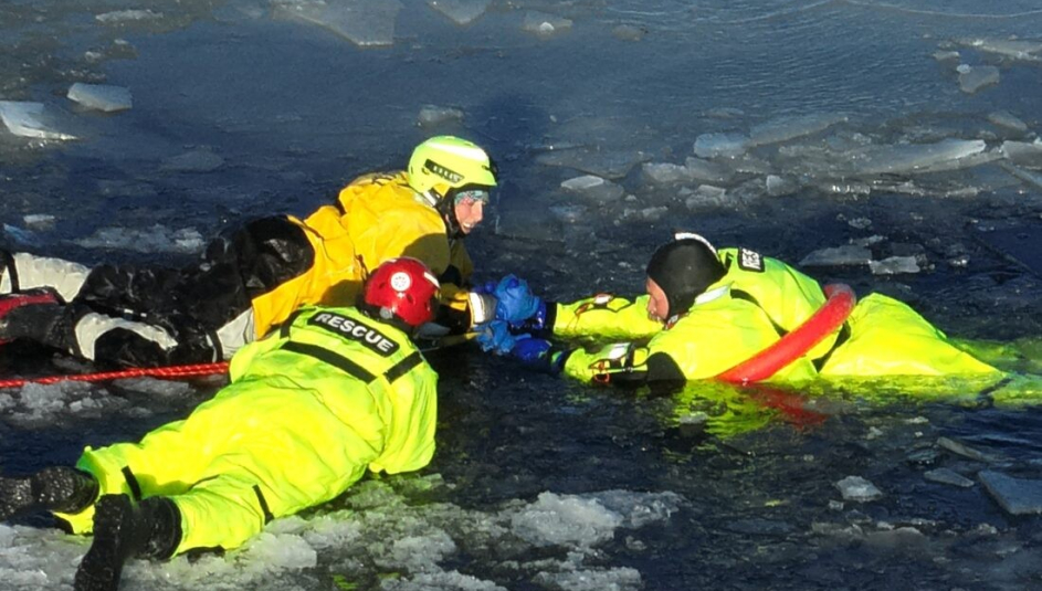 Members of the Delta County, Mich. Ice Rescue Task Force participate in a training exercise.