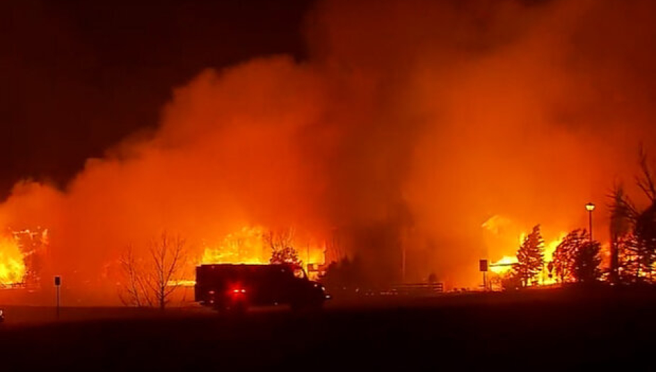 Flames engulf homes in the Marshall Fire, Dec. 30, 2021. Photo by NOAA Boulder