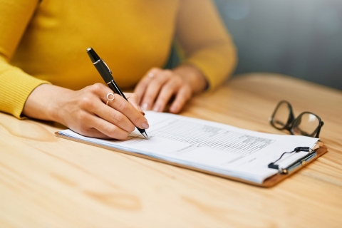 Filling-out-survey.jpg Image of Filling-out-survey.jpg