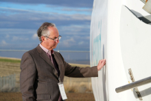 Carson County, Texas Judge Dan Looten gets hands-on with a wind turbine at the Avangrid National Training Center — his first time touching one, despite more than 700 turbines in the county. Photo by Charlie Ban